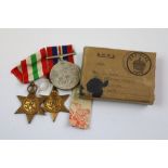A Collection Of Three World War Two Full Size Medals In The Original Issue Box To Include The