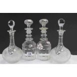 Four vintage cut glass Decanters with stoppers and five vintage Decanter wine labels to include an