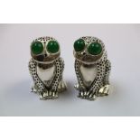 Pair of continental silver condiments in the form of frogs / toads set with green stone eyes