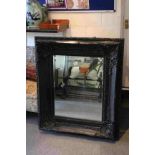 Large Ornate Swept Ebonised Framed Bevelled Mirror having foliate design 67cm x 53cm