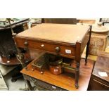 Early 19th century Low Table with Single Drawer raised on slender turned legs and brass castors,