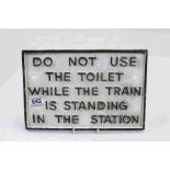 Cast Iron Sign ' Do not use the toilet while the train is standing in the stattion '