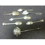 Pair of silver coffee spoons, openwork finial with engraved foliate decoration to stem, makers