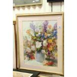 A contemporary framed still life print of flowers in a vase by E Hesse