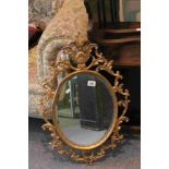 Mid 20th century Gilt Coloured Rococo Style Mirror with Bevelled Edge, 75cms high