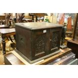 19th century Oak Cutlery Box, the two carved hinged doors opening to reveal a bank of five blue