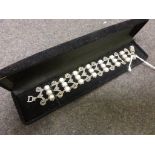 Silver bracelet set with three rows of pearls and marcasites