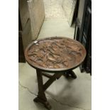 Oriental Hardwood Folding Coffee / Side Table, the heavily carved top with glass cover