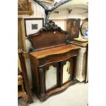 Victorian Mahogany Chiffonier with ornately scroll carved back above serpentine front cushion drawer