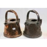 Two vintage Copper Kettles with swing handles, one with a polished finish