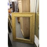 A large antique gilt picture frame .