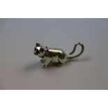 Solid silver miniature figure of a cat set with emerald eyes and ruby collar