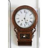 An Antique two train mahogany inlaid drop dial wall clock.