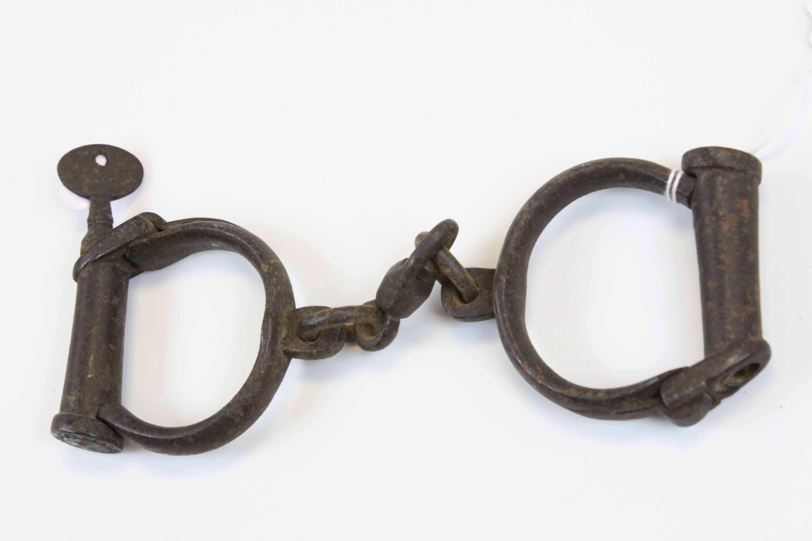 Vintage pair of cast Iron Police type Handcuffs by "Hiatt"