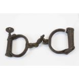 Vintage pair of cast Iron Police type Handcuffs by "Hiatt"