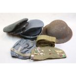 A Collection Of Military Headgear To Include A British Helmet, RAF Cap, Russian Officers Cap And