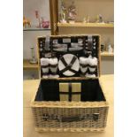 Web Hampers Wicker Picnic Basket fitted with a Four Place Setting Inside together with a Wicker Four