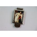 Silver money clip depicting a nude lady