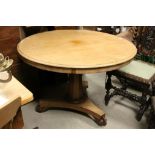 19th century Mahogany Tilt Top Circular Centre Table raised on octagonal pillar support and platform