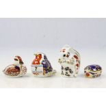 Four ceramic Crown Derby paperweights to include Squirrel, Millennium Bug, Robin and Duck