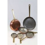 Set of Seven Copper Graduating Frying Pans with Brass Handles