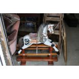 Wooden Painted Dapple Grey Rocking Horse with Bridle and Saddle on a Pine Trestle Stand together
