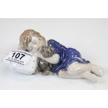 Royal Copenhagen ceramic model of a sleeping Child and numbered 675