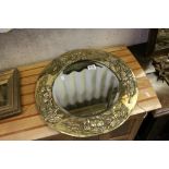 Arts and Crafts Style Circular Brass Framed Mirror with Fruit and Foliage Relief Decoration, 48cms
