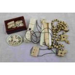 Bone items to include miniature bone dominoes set, bone jewellery and bone rosary beads