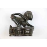 Carved hardwood erotic netsuke depicting a bathing woman and frog