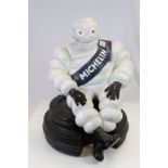 2 Piece large Michelin Man advertising display with seated figure on stacked tyres