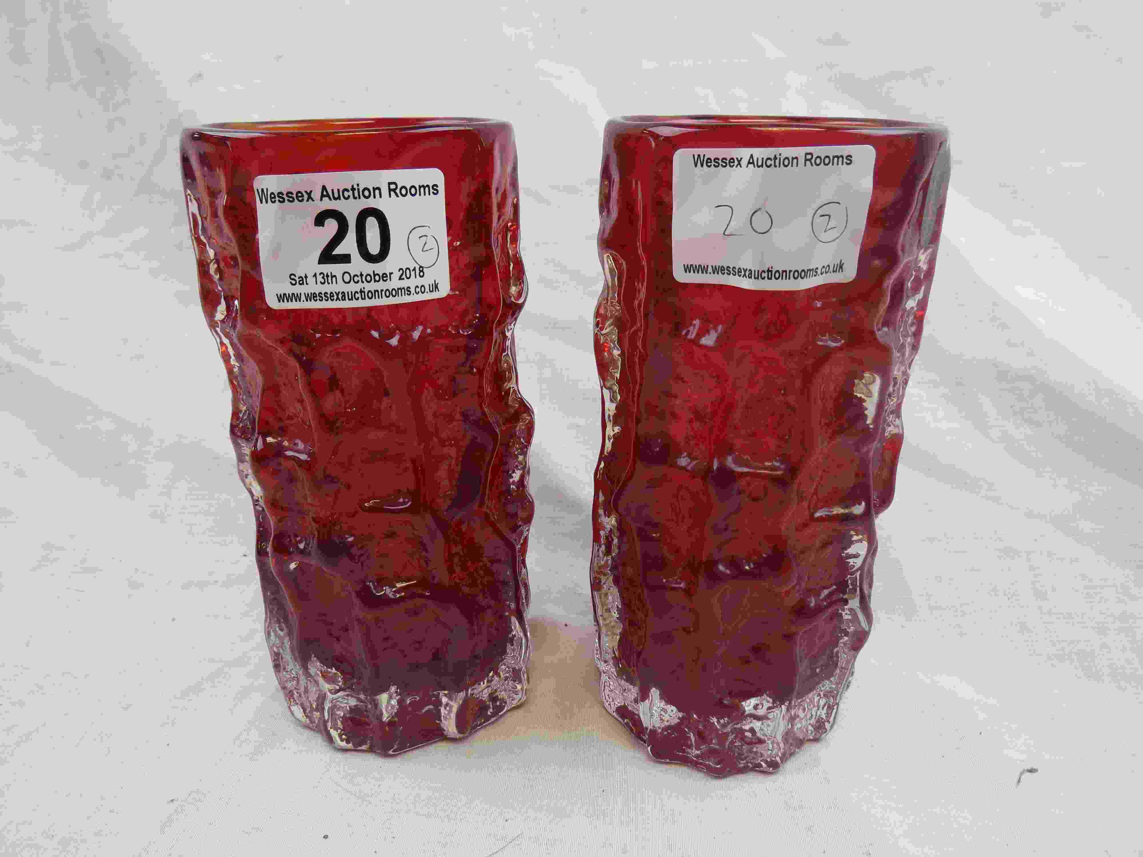 Geoffrey Baxter for Whitefriars. a pair of ruby red cylindrical bark vases from the Textured