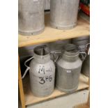 Two Aluminium Milk Churns, approx. 50cms high