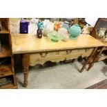 French Pine Long / Serving Table comprising Three Drawers over Shaped Apron and raised on turned