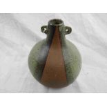 Tony Gant studio pottery vase of onion form with narrow neck and small twin handles, mottled green