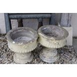 Pair of Reconstituted Stone Garden Urns on Stands