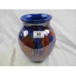 Poole Pottery Cosmic pattern vase, retains original label, stamped to base, height approximately