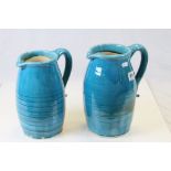 Two Persian Cyan Glazed Pitchers / Water Jugs, approx. 25cms high