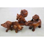 Three Chinese Wooden Netsukes - Fish, Cat carrying Kittens in a Basket and a Hippo with a Rabbit
