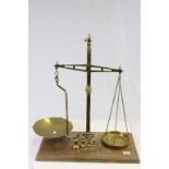 Pair of Avery Brass shop balance Scales with wooden base & Brass weights, the scale pans having