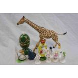 Ceramic items to include a realistically modelled giraffe, six Coalport The Snowman characters, a