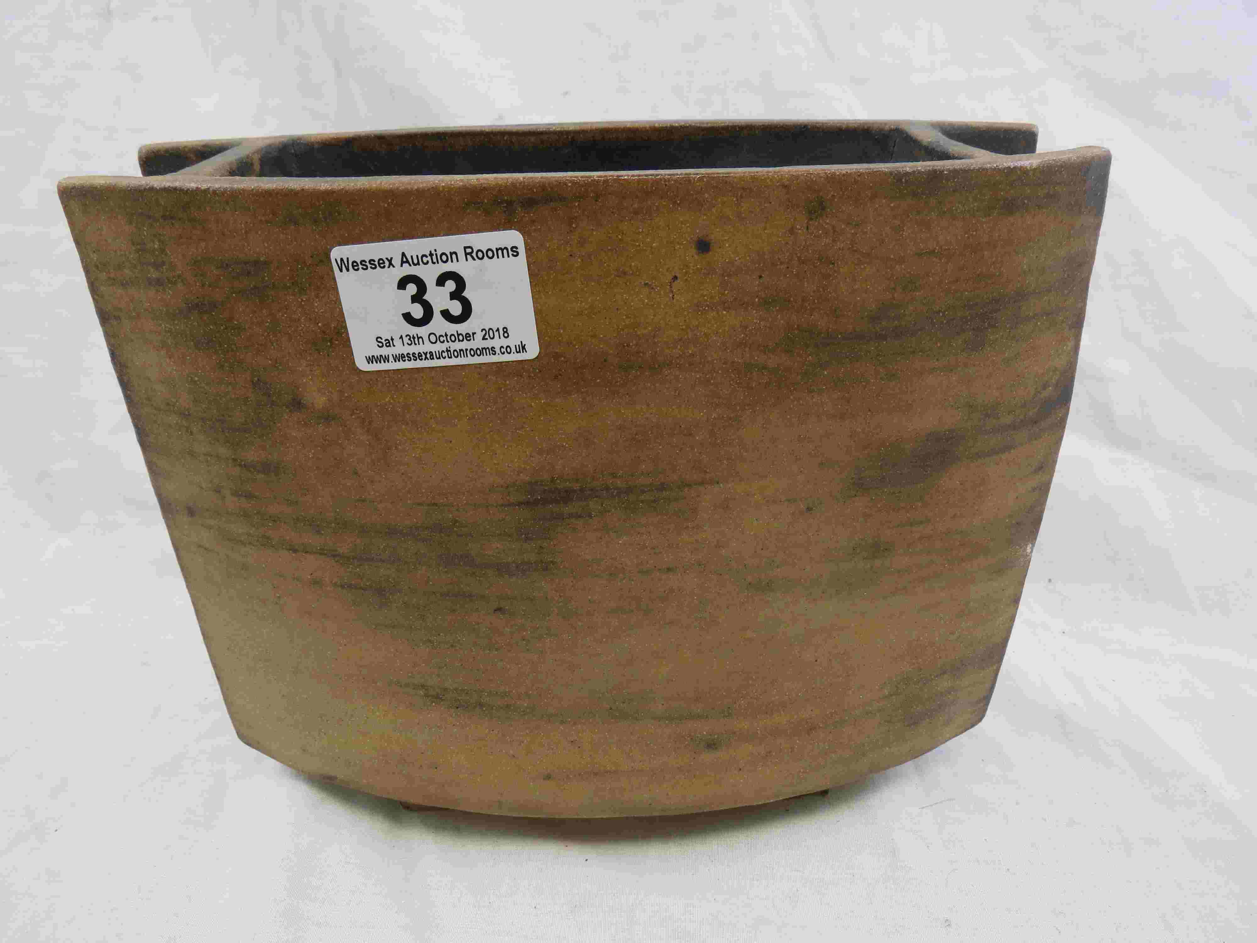 A rectangular studio pottery rustic vase, signed L Rye to base, height approximately 18cm