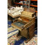 Victorian Walnut Piano Davenport, the rear rising stationery compartment with shaped and fretwork