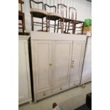 Late 19th / Early 20th century Oak Painted Triple Wardrobe, the double doors opening to reveal