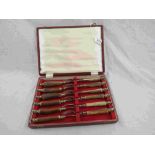 Cased set of six knives and forks, antler handles