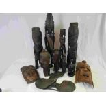 Group of African Ethnic Tribal Wooden Carved Items including Two Fertility Figures, Three Further