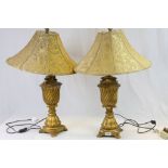 Pair of gold painted Plaster Urn type electric Lamps with Gold fabric shades