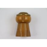 Novelty carved hardwood and brass lighter in the form of a champagne cork, height approximately 5cm