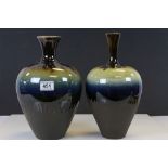 Two Persian Drip Glazed Vases 34cms high and 33cms high