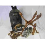 Collection of Ethnic Tribal Wooden Carved Items including a Sphinx Style Bust, Folding Table Base